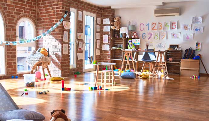 day care center room with colorful furniture and toys