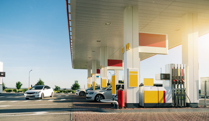 A gas station with multiple fuel pumps