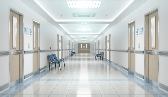 A clean and empty hospital corridor