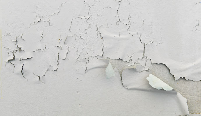 Close-up of a wall with peeling paint