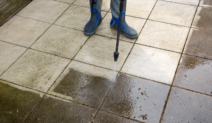 Stain removal using pressure washing